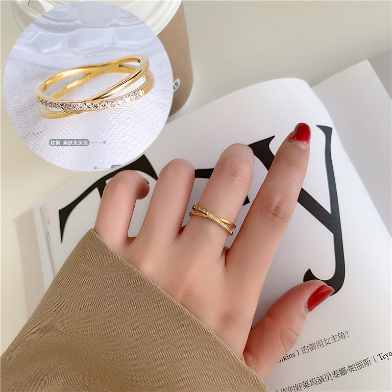 Elegant Cross-Design Micro-Pave Ring - Delicate Interlocking Titanium Steel Band in Gold